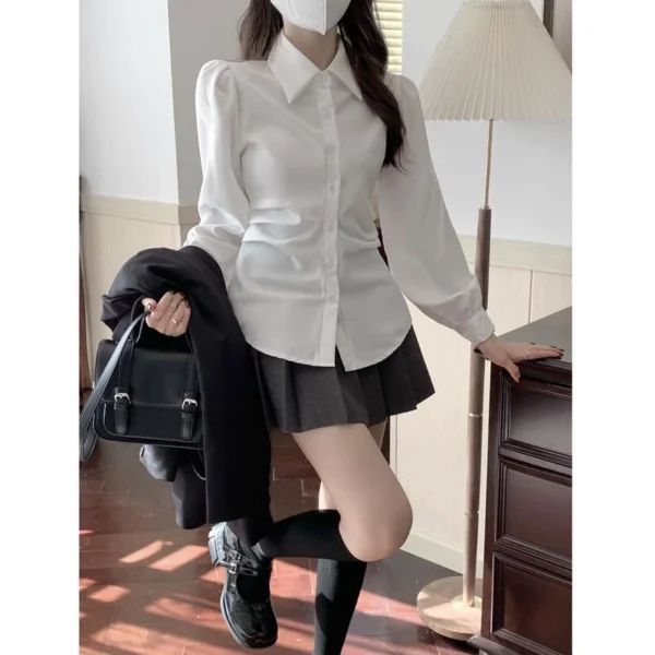 5c50e6082e077de0a83b0fc61f07931d.webp Korean women waist white shirt bubble long sleeves