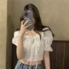 66b1b5ead085a4817d15b24f44dd1af6.webp Womens new Korean summer 2021 belted puffy sleeve crop top
