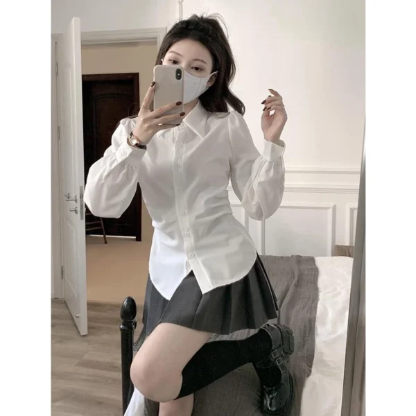 bdebed6a462ea6473118ce5edecec241.webp Korean women waist white shirt bubble long sleeves