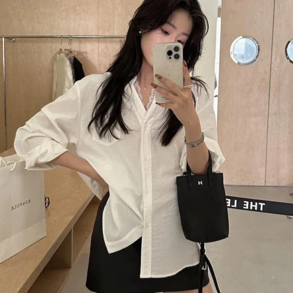 Autumn womens solid color Vneck lace shirt long sleeve loose version